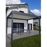 Pergola bioclimatique 4 poteaux 5m15 en pose lames perpendiculaires à la façade