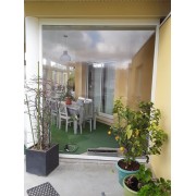 Store transparent électrique Blanc Ral 9010 pour terrasse