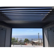 Lames gris 7016 pergola bioclimatique S3 4x3.5m lames parallèles adossée